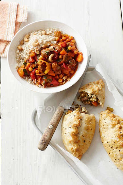 Lamb tagine with baked pastries — Stock Photo