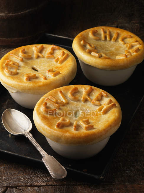 Tray of chicken pies — Stock Photo