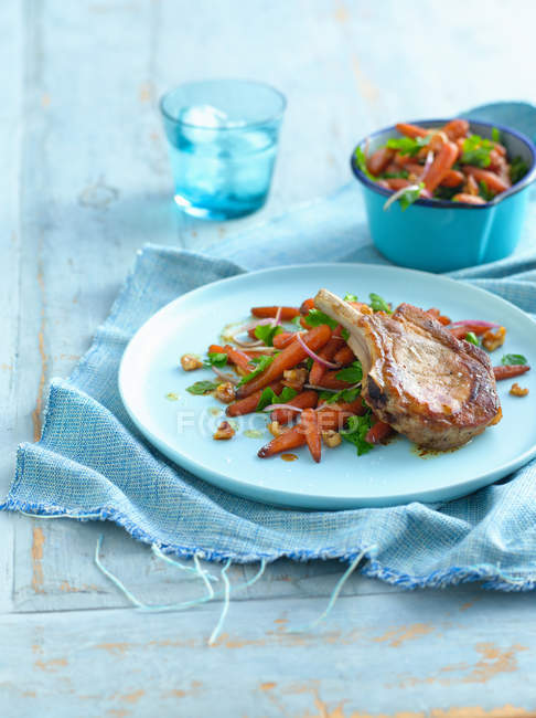 Plate of chops with vegetables — Stock Photo