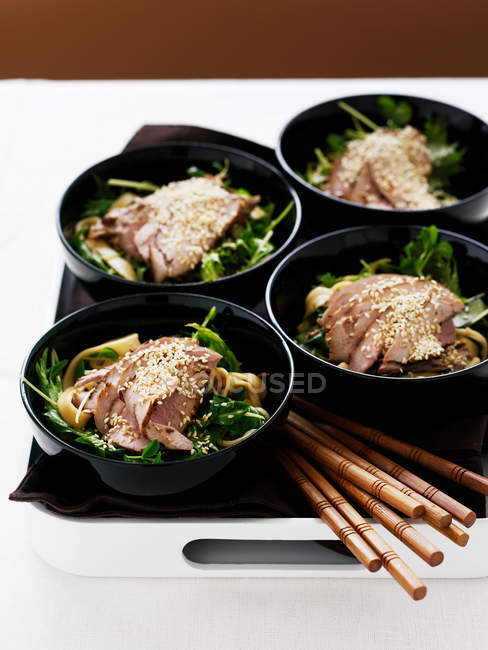 Bowls of pork fillets — Stock Photo