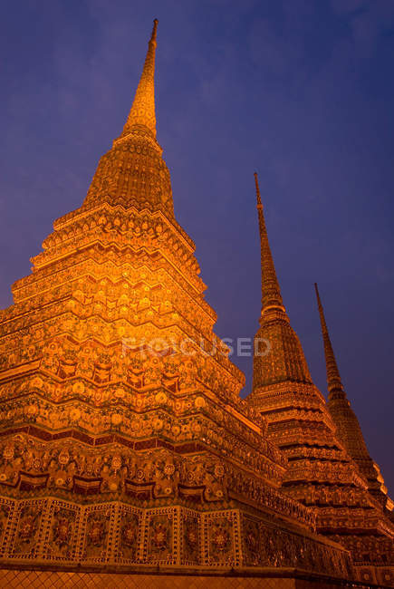 Ornate carved spires at night — Stock Photo