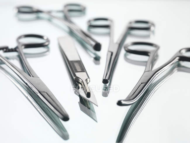 Surgical tools on white — Stock Photo