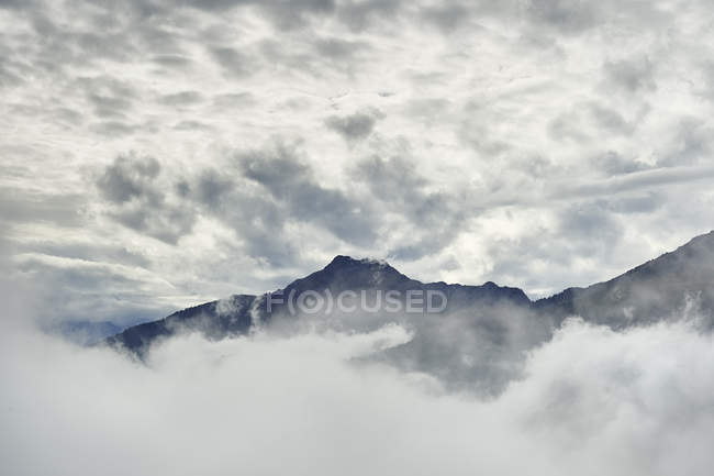 Scenic view of Mountains in clouds, Chamois, Italy — Stock Photo