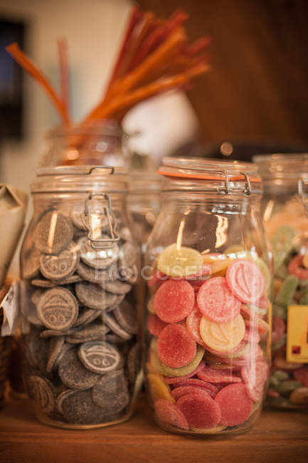 Close up shot of jars with hard candies — Stock Photo