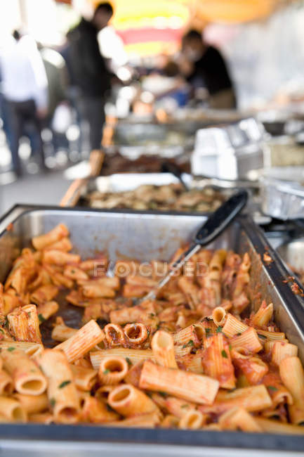 Pasta for sale at street cart — Stock Photo