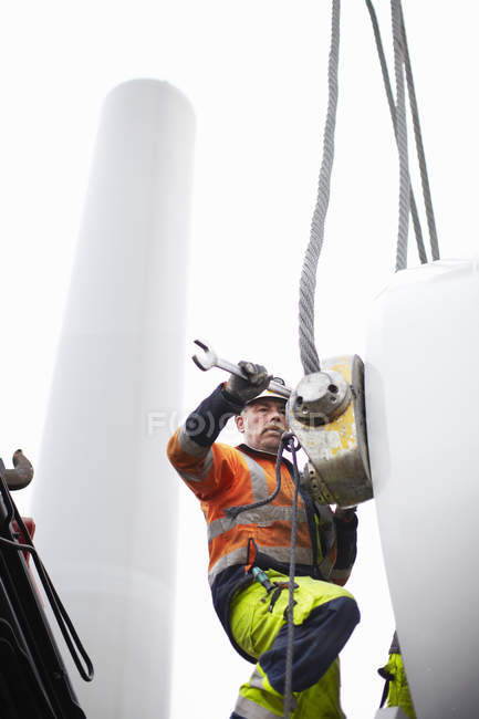 Engineer working on wind turbine construction site — Stock Photo