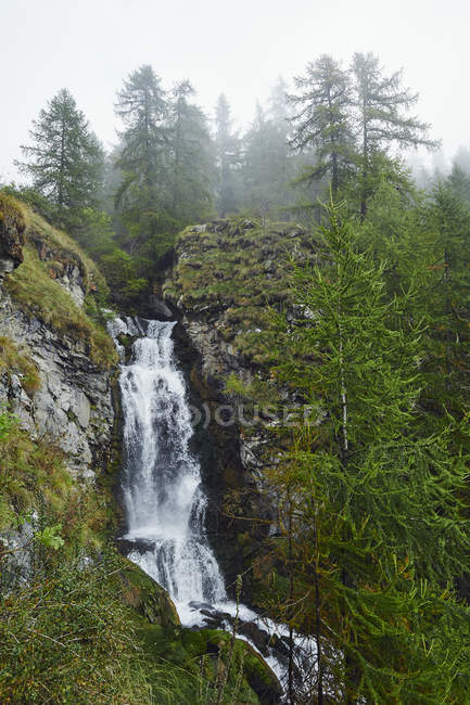 Scenic view of Waterfall, Chamois, Italy — Stock Photo