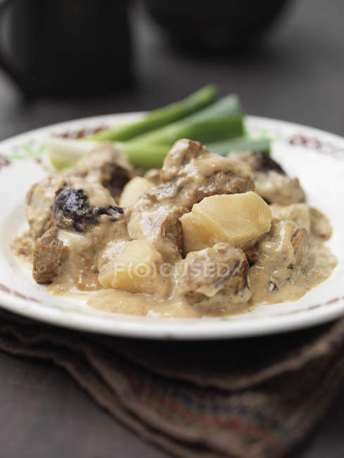 Plate of old spot pork and cider casserole — Stock Photo