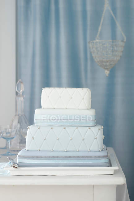 Silver and blue cushion type cake — Stock Photo