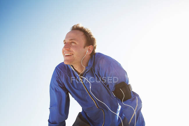 Portrait of sporty man from low angle — Stock Photo