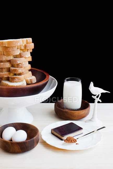 Dessert with milk, eggs and bread — Stock Photo