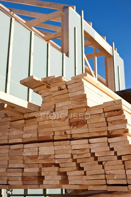 Close up of stacked wood on construction site — Stock Photo