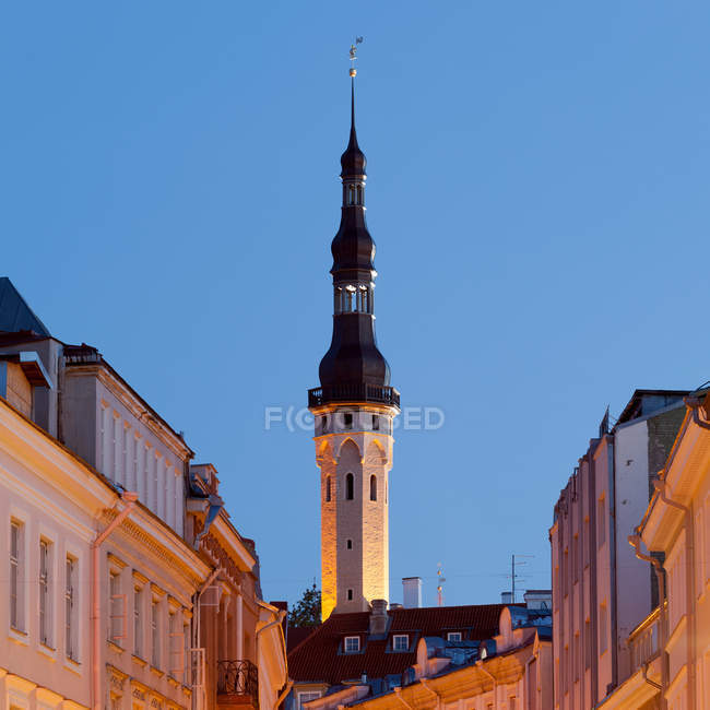 Church steeple and buildings around — Stock Photo
