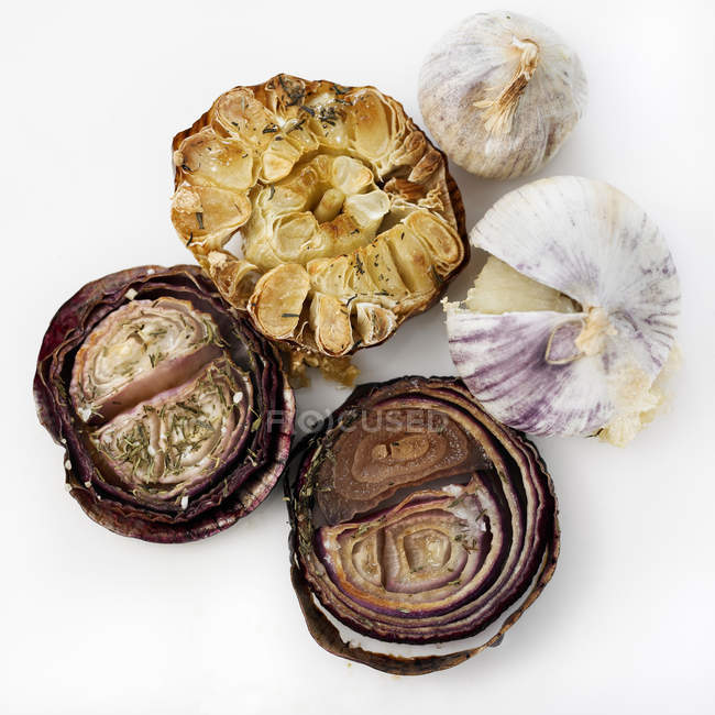 Roasted garlic and onions — Stock Photo