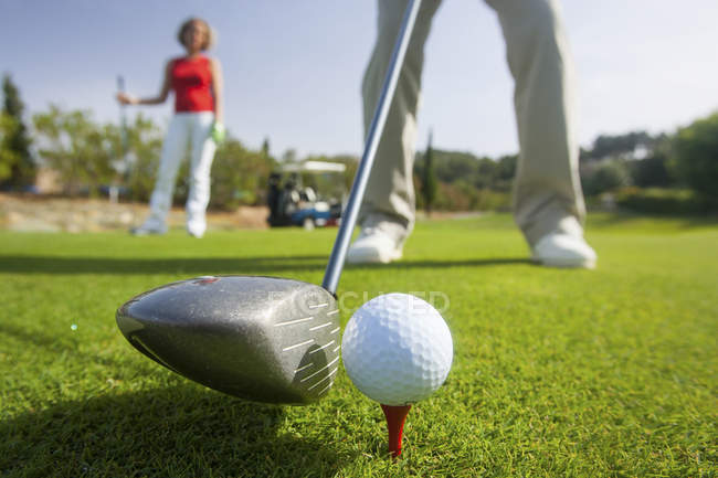 Cropped shot of male golfer teeing off, Majorca, Spain — Stock Photo