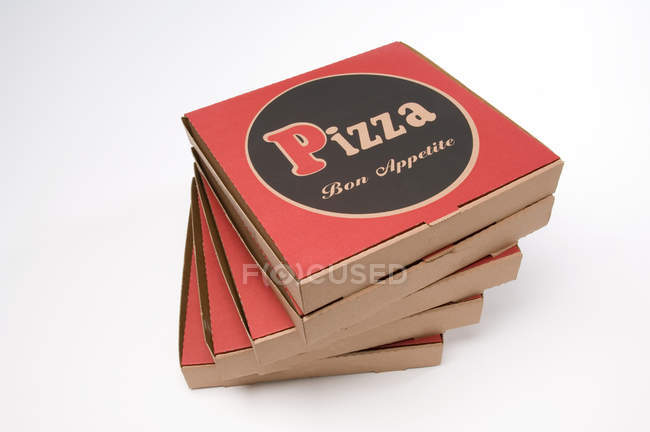 Stack of pizza boxes — Stock Photo