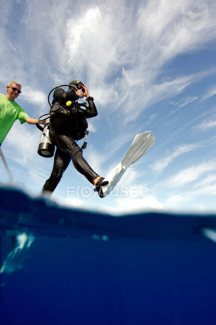 Giant stride entry into water — Stock Photo