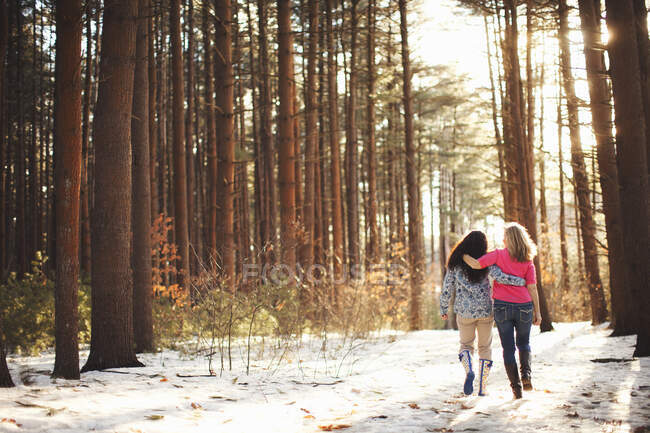 Mature women walking in forest — Stock Photo