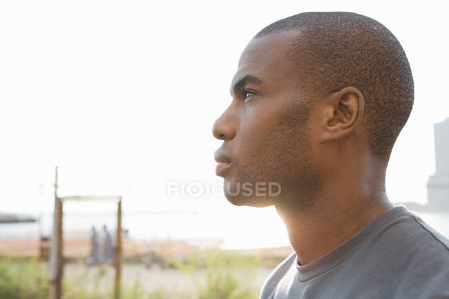 Profile of a man looking away — Stock Photo