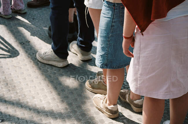 Queue of children at sunny day — Stock Photo