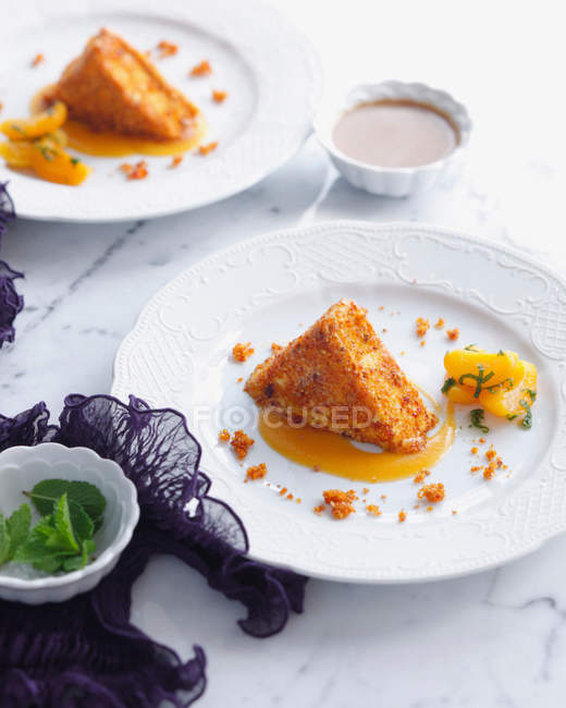 Fried ice cream with apricots and syrup — Stock Photo