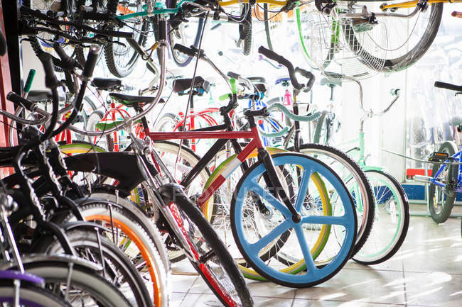 Bicycles in row for sale at store — Stock Photo