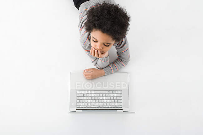 Boy with a laptop — Stock Photo