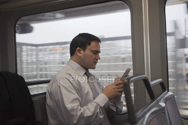 Businessman commuting to work — Stock Photo