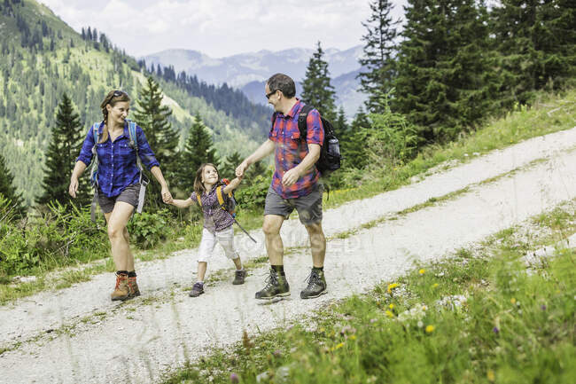 Parents and daughter hiking, Tyrol, Austria — Stock Photo