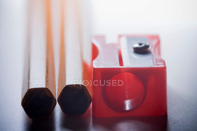 Pencils and pencil sharpener — Stock Photo