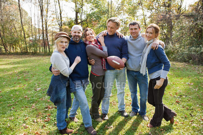Mature friends with football — Stock Photo
