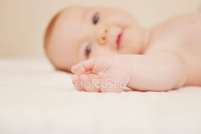 Focus on baby's hand — Stock Photo
