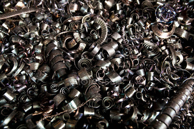 Steel shavings in steel forge — Stock Photo