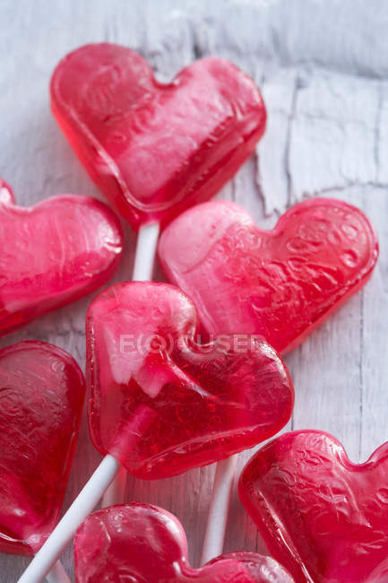 Red heart shaped lollipops, close up shot — Stock Photo