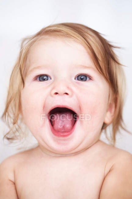 Close up of baby girls smiling face — Stock Photo