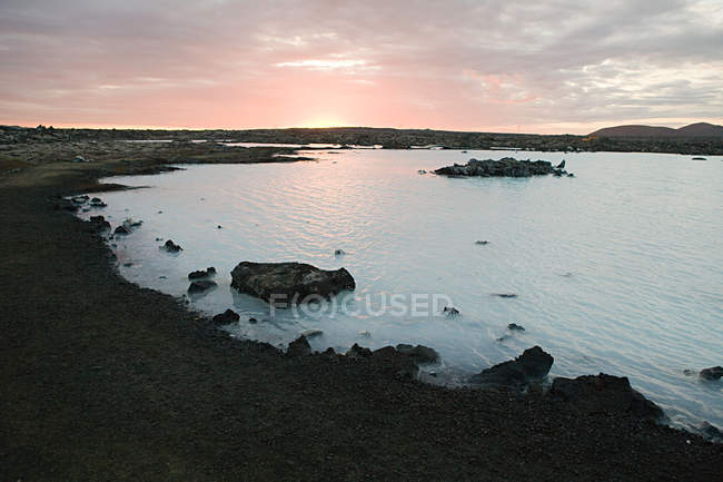 Sunset at blue lagoon — Stock Photo