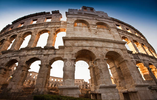 Bottom view of Ancient ruins of arena — Stock Photo