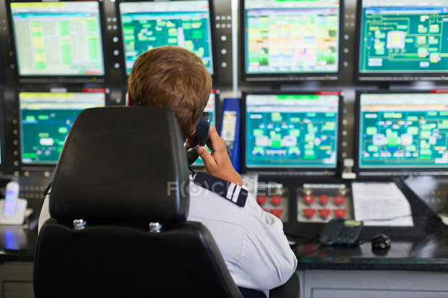 Man working in security control room — Stock Photo