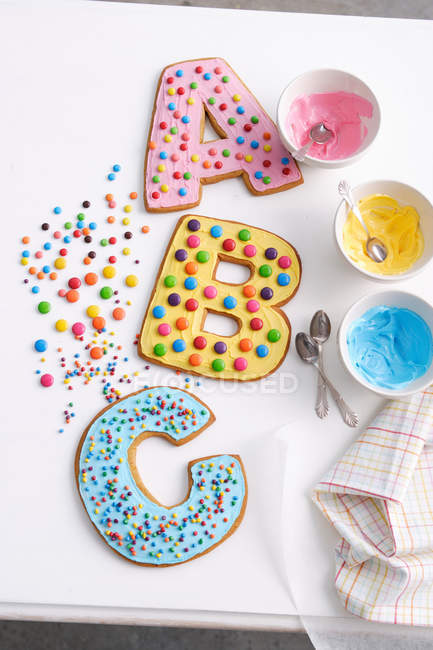 Decorated cookies in letter shapes — Stock Photo