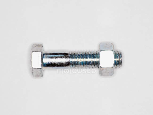 Top view of nut and bolt isolated on white background — Stock Photo