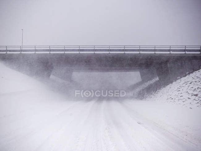 Snowy overpass in rural landscape — Stock Photo