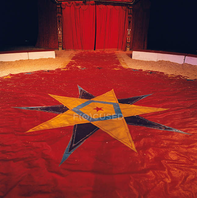 Star shape on circus tent floor — Stock Photo