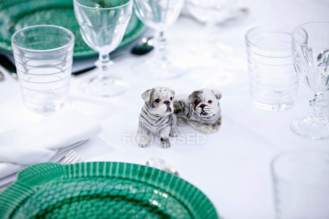 Close up of Dog figurines on table — Stock Photo
