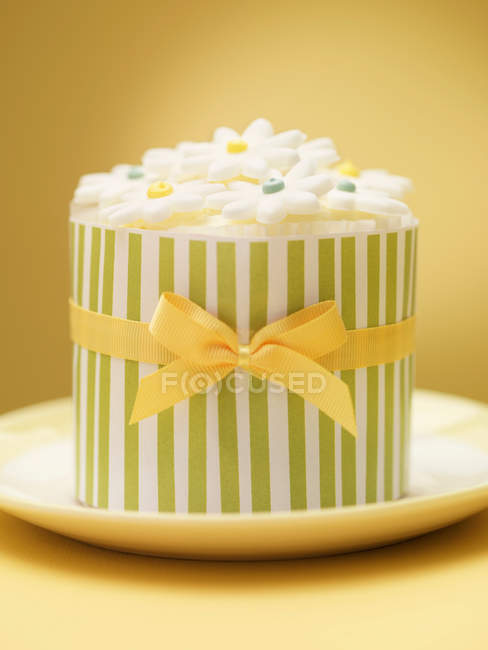 Decorated cookies in ornate tin — Stock Photo