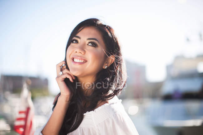 Portrait of young woman on yacht in marina, San Francisco, California, USA — Stock Photo