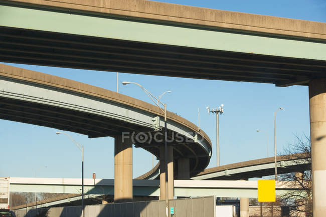 Elevated highways in sunlight with blue sky — Stock Photo