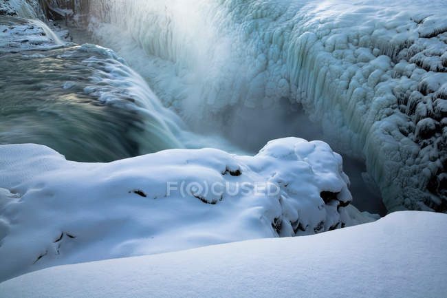 Steam rising from glacial hot spring — Stock Photo