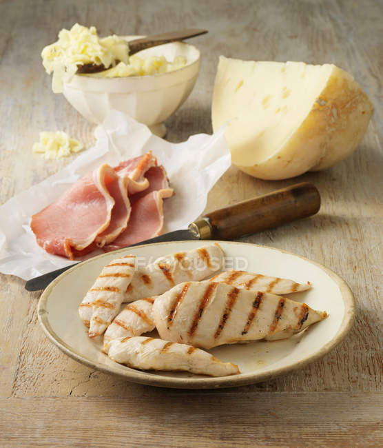Ingredients for chicken and bacon ceasar pizza — Stock Photo