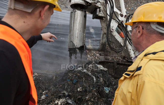 Workers at garbage collection center — Stock Photo