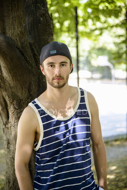 Portrait of male basketball player in park — Stock Photo